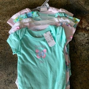 5-pack of baby girl onesies